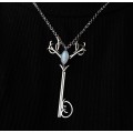 Silver deer key pendant