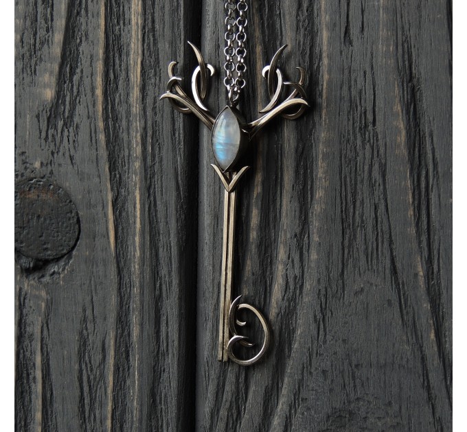 Silver deer key pendant